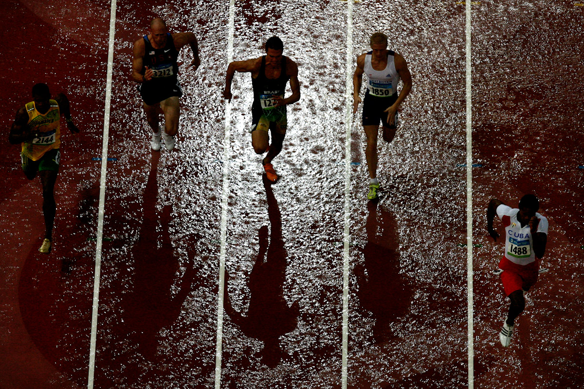 Athletes compete in the rain during the Men's Decathlon 100m Final held at the National Stadium during Day 13 of the Beijing 2008 Olympic Games on August 21, 2008 in Beijing, China.