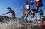 A general view of competitors leaping over the water jump during the Men's 3000m Steeplechase at the Pan Am Games on July 21, 2015 in Toronto, Canada. 