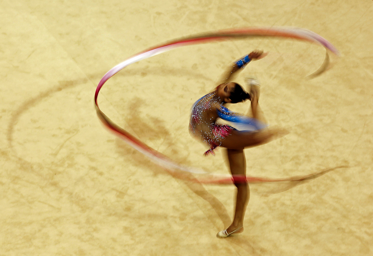 Andreina Acevedo of Venezuela performs With her Ribbon at the Rhythmic Gymnastic finals during Day Four of the XVI Pan American Games at the Nissan Gymnastics Complex on October 18, 2011 in Guadalajara, Mexico.  