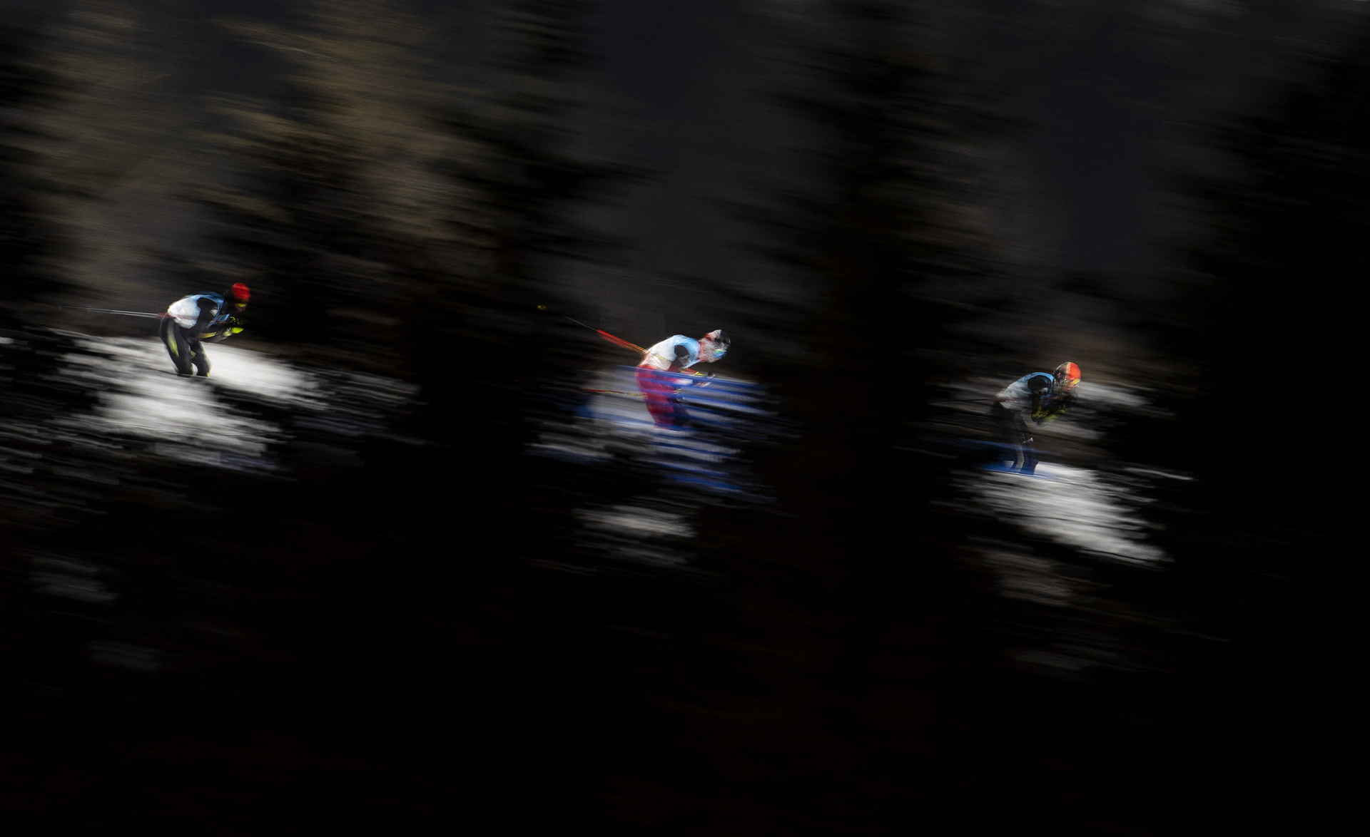 ZHANGJIAKOU, CHINA - FEBRUARY 09: Athletes compete during Nordic Combined Individual Gundersen Normal Hill/10km, Cross-Country Round at The National Cross-Country Skiing Centre on February 09, 2022 in Zhangjiakou, China.  