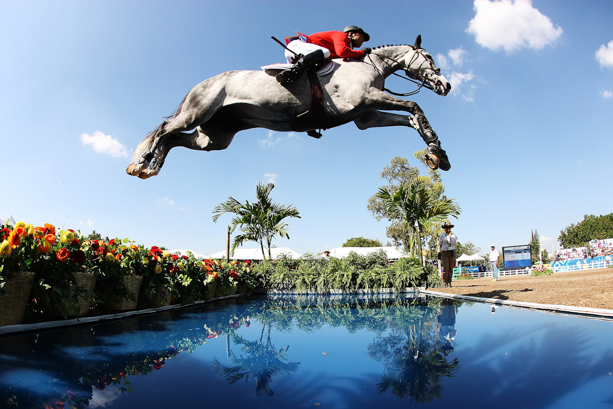 Kent Farrington of the USA makes a jump during the Jumping Competition at the Guadalajara Country Club on Day 13 of the  XVI Pan American Games on October 27, 2011 in Guadalajara, Mexico. 