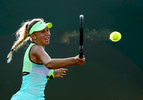Amanda Anisimova returns a shot against Taylor Townsend  during day 3 of the Miami Open at Crandon Park Tennis Center on March 22, 2017 in Key Biscayne, Florida.