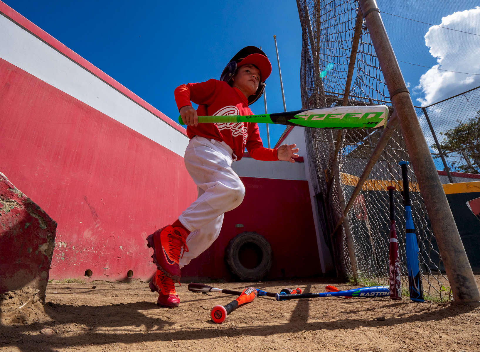 CAYEY, PUERTO RICO - NOVEMBER 10:  A boy prepares to bat in a Little League baseball game on November 10, 2018 in Cayey, Puerto Rico. The effort continues in Puerto Rico to remain and rebuild more than one year after the Hurricane Maria hit and devastated the island on September 20, 2017. The official number of deaths from the disaster is 2,975. 