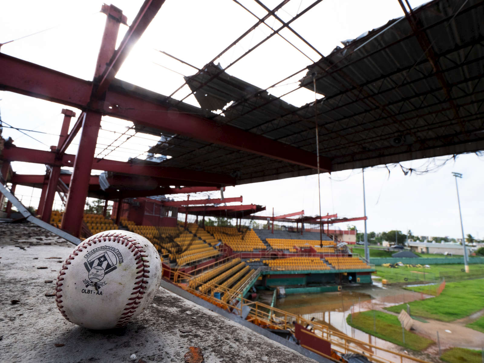 CAROLINA, PUERTO RICO - NOVEMBER 13:  A baseball sits in the stands at the Roberto Clemente Municipal Stadium on November 13, 2018 in Carolina, Puerto Rico. The ballpark was once used for minor league AA baseball.  The stadium is set to be demolished due to the extended damage it sustained from Hurricane Maria.  The effort continues in Puerto Rico to remain and rebuild more than one year after the Hurricane Maria hit and devastated the island on September 20, 2017. The official number of deaths from the disaster is 2,975. 