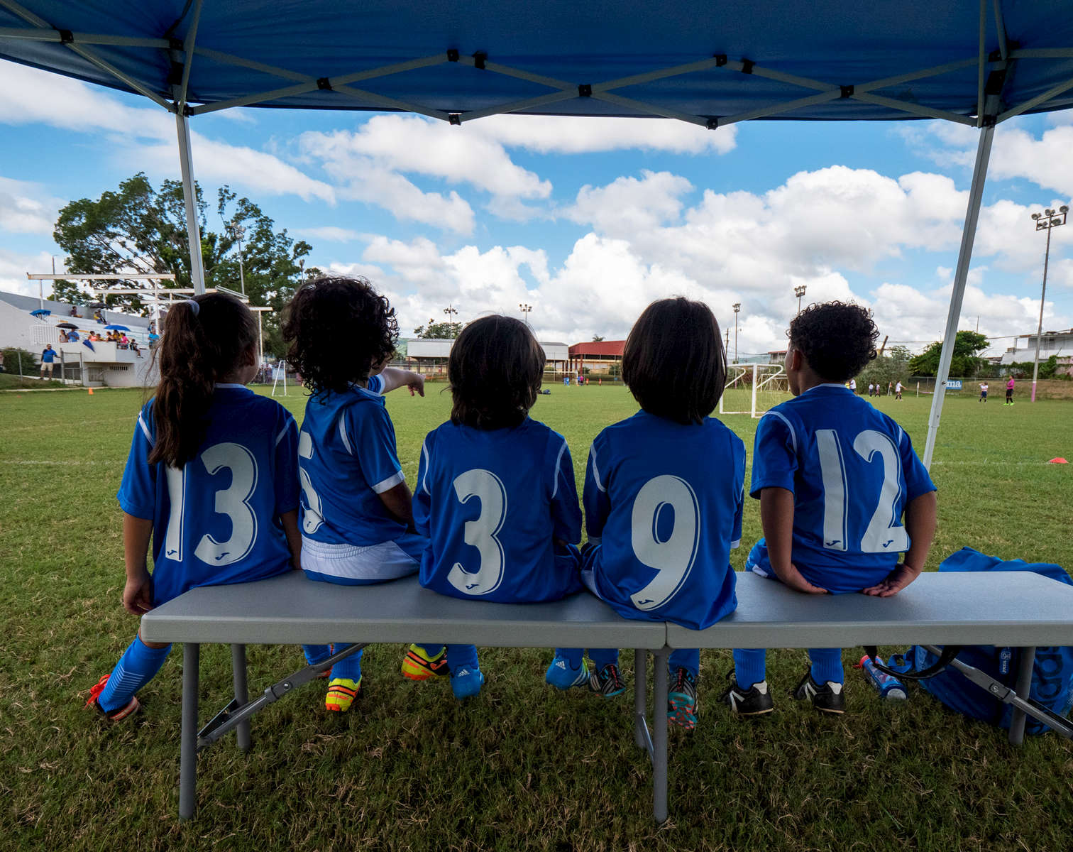 CAGUAS, PUERTO RICO - NOVEMBER 10: Children watch a Little League Soccer game on November 10, 2018 in Caguas, Puerto Rico. The effort continues in Puerto Rico to remain and rebuild more than one year after the Hurricane Maria hit and devastated the island on September 20, 2017. The official number of deaths from the disaster is 2,975. 