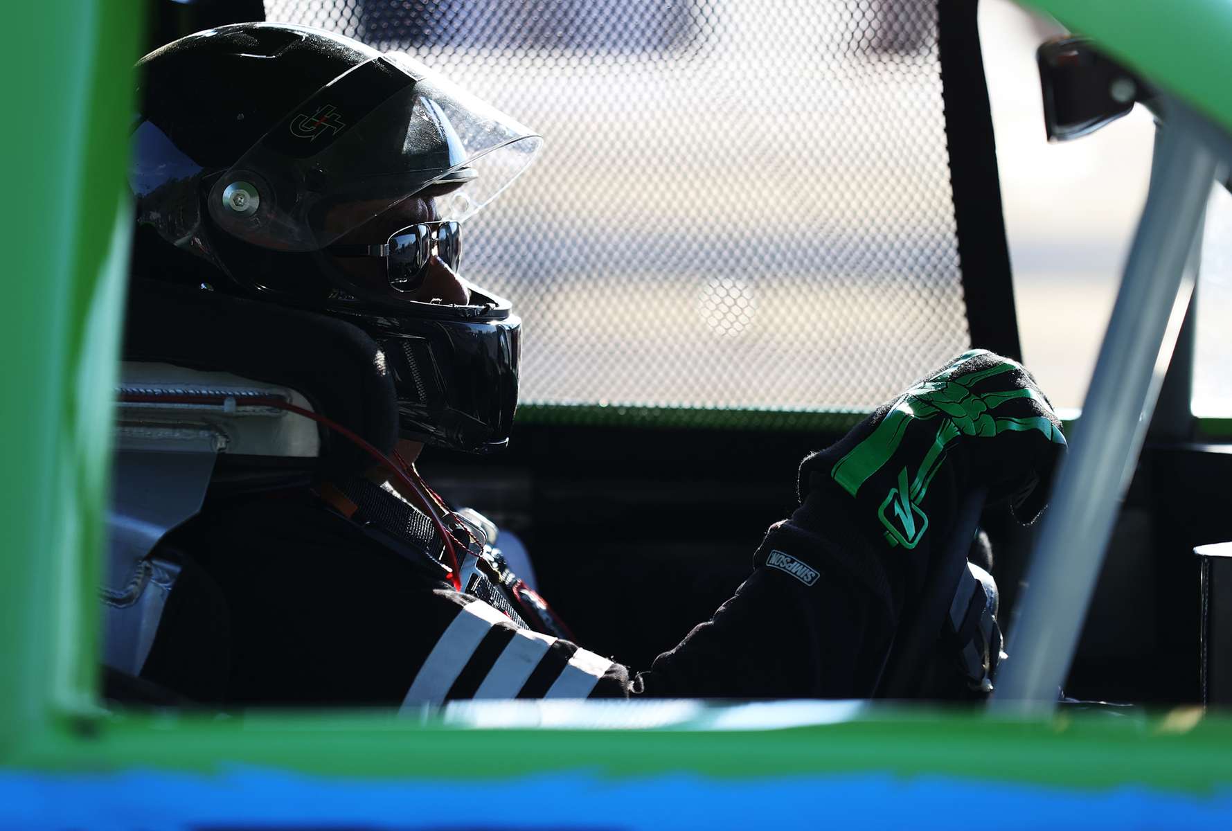 A driver looks on before a race during NASCAR Advance Auto Series Opening Night  at Riverhead Raceway on August 01, 2020 in Riverhead, New York.  The race track had been closed due to the coronavirus COVID-19 pandemic.  More than 4,585,258 people in the United States alone have been infected with the coronavirus and at least 154,000 have died.  