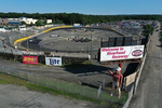 An aerial view of a cars racing around the track during NASCAR Advance Auto Series Opening Night at Riverhead Raceway on August 01, 2020 in Riverhead, New York.  The race track had been closed due to the coronavirus COVID-19 pandemic.  More than 4,585,258 people in the United States alone have been infected with the coronavirus and at least 154,000 have died.  