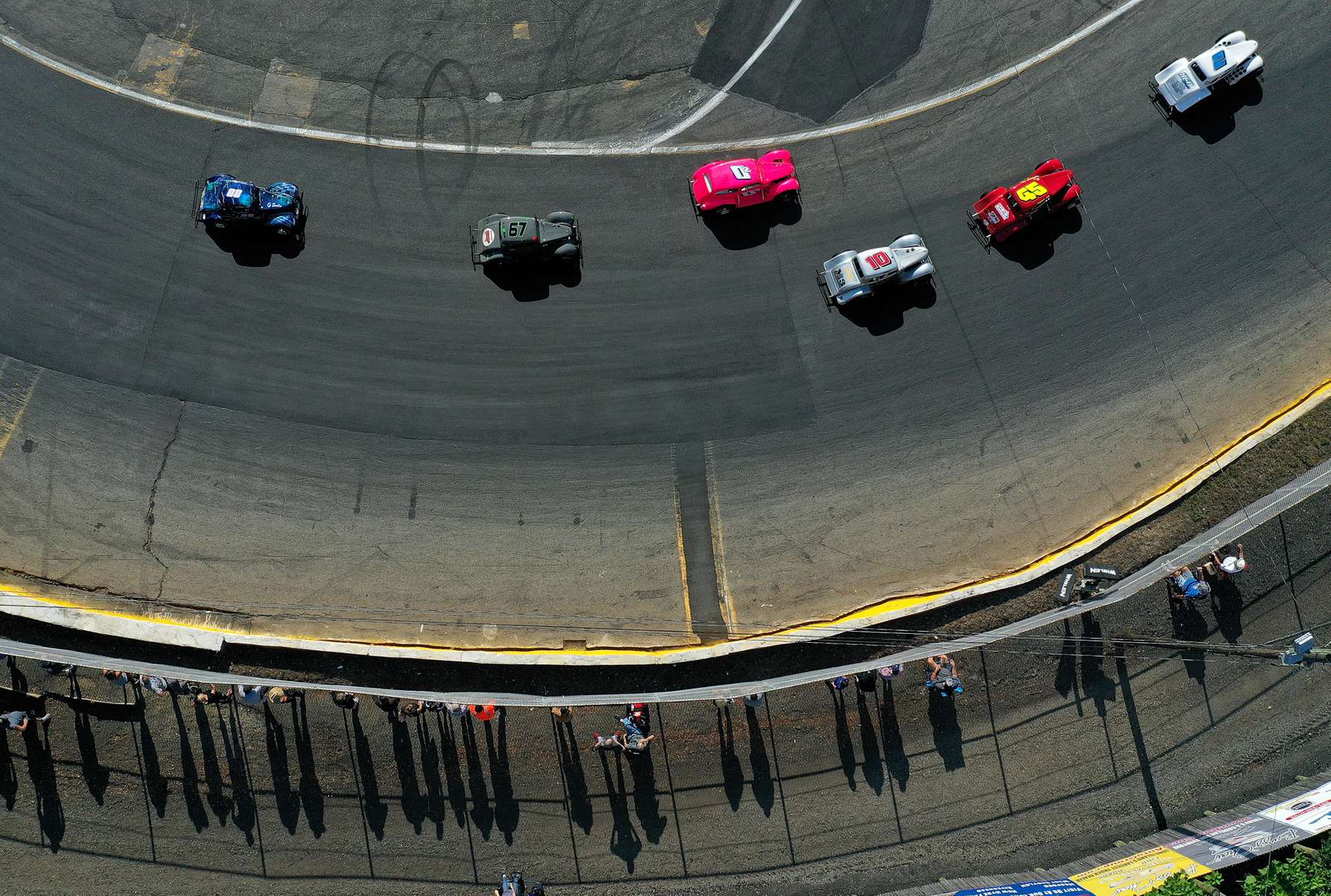 An aerial view of a cars racing around the track during NASCAR Advance Auto Series Opening Night at Riverhead Raceway on August 01, 2020 in Riverhead, New York.  The race track had been closed due to the coronavirus COVID-19 pandemic.  More than 4,585,258 people in the United States alone have been infected with the coronavirus and at least 154,000 have died.  