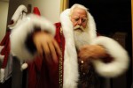 Santa Claus student Tom Carmendy, of Westminster, Colorado puts on his Santa Claus suit prior to performing for a group of elementary school children during the Charles W. Howard Santa Claus School workshop on October 17, 2008 in Midland, Michigan.