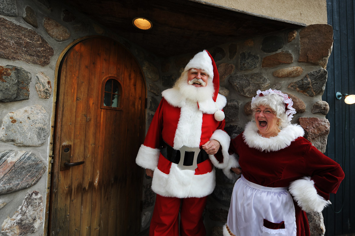 Students John Siebler of Fort White, Florida and Mary Ellen Stroh, of Midland Michigan are dressed up as Santa Claus and Mrs Claus and share a laugh prior to appearing for local children during the Charles W. Howard Santa Claus School workshop on October 17, 2008 in Midland, Michigan.  
