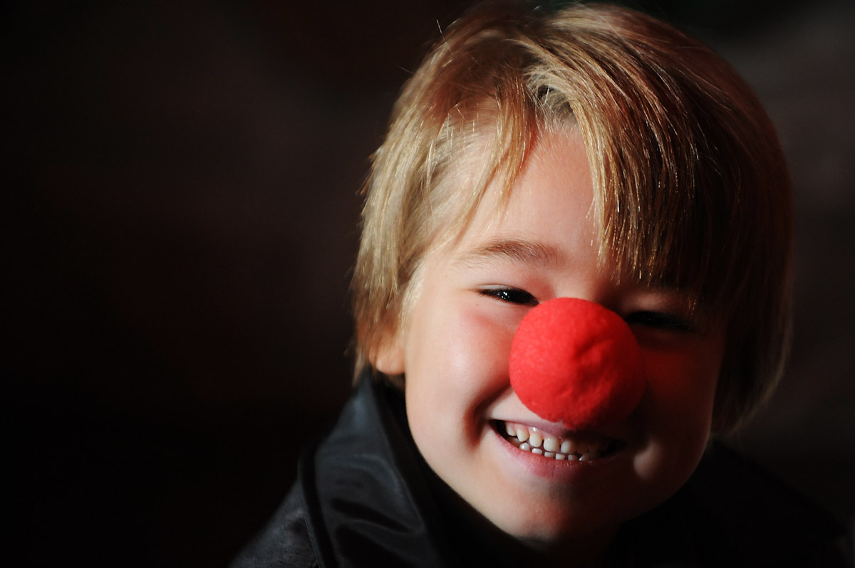Eli Walker, 5 years old of Midland Michigan smiles after recieving a Rudolph The Red Nosed Reindeer nose from a Student Santa Claus during the Charles W. Howard Santa Claus School workshop on October 17, 2008 in Midland, Michigan.  