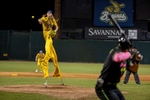 Dakota {quote}Stilts{quote} Albritton #14 of the Savannah Bananas pitches against the Party Animals at Grayson Stadium on May 11, 2023 in Savannah, Georgia.  Albritton plays Banana Ball on Stilts. He plays the field, bats, and he pitches all while wearing a pair of stilts while playing.  