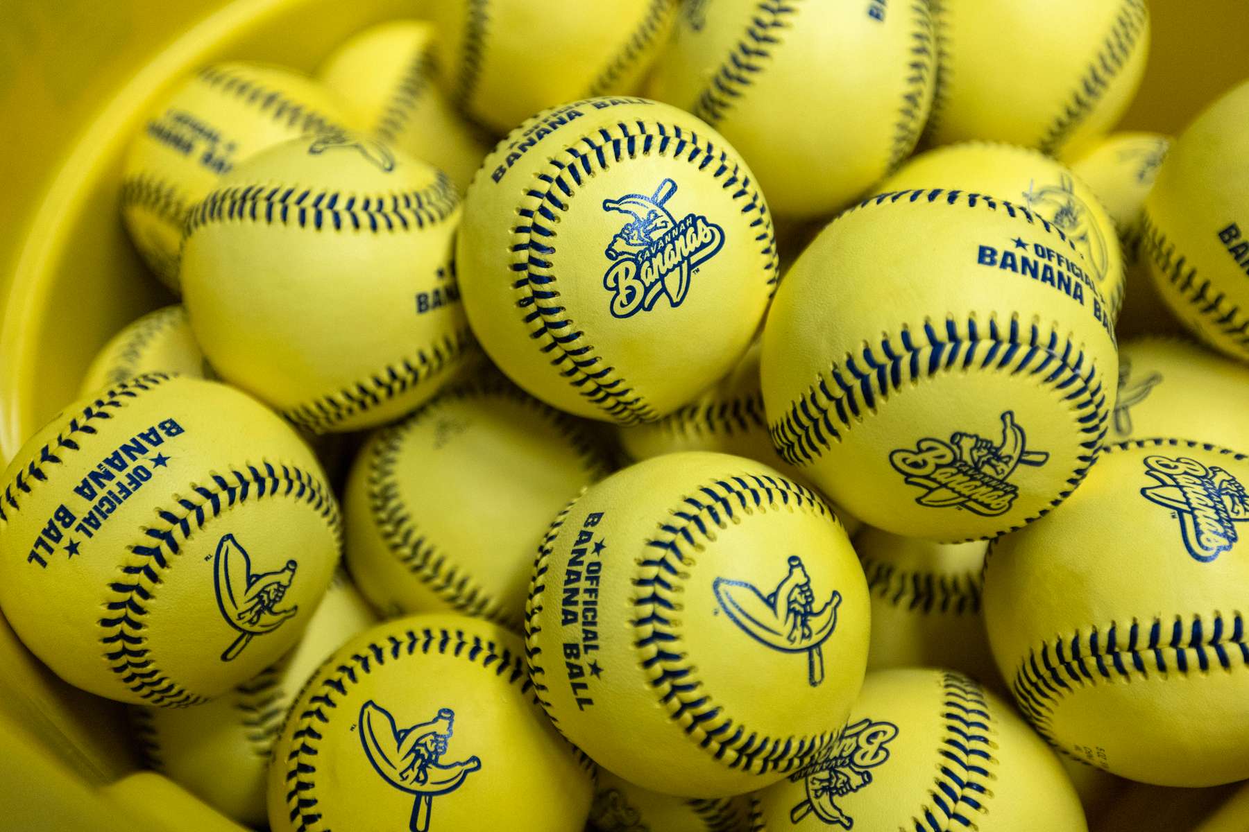 Savannah Bananas baseballs are seen in a bucket prior to their home opener against the Party Animals at Grayson Stadium on February 25, 2023 in Savannah, Georgia.  