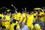 Fans throw toilet paper as the The Savannah Bananas play their home opener against the Party Animals at Grayson Stadium on February 25, 2023 in Savannah, Georgia.  