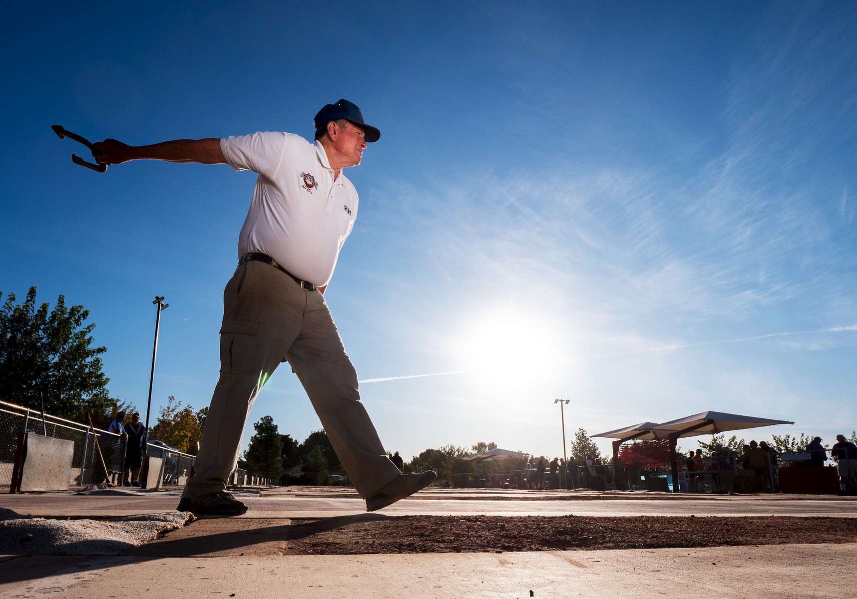Senior athlete Roy Buhler aged seventy one throws a horse shoe before the start of the Horse shoes competition during the Huntsman World Senior Games on October 16, 2019 in St. George, Utah.