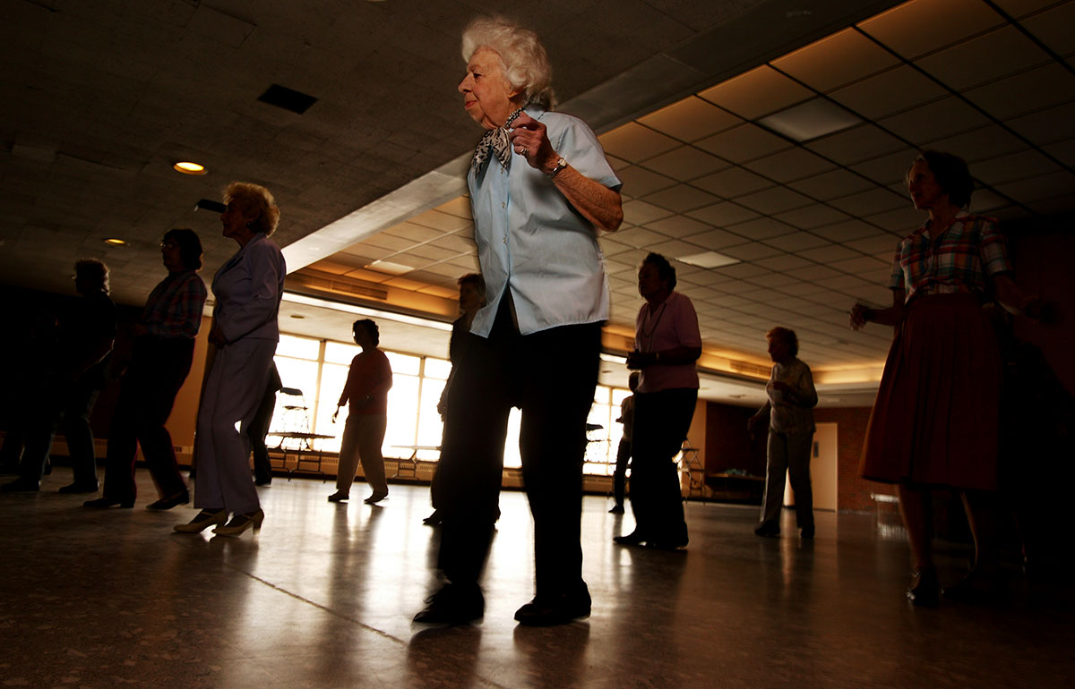 Caroline Dodge, 85 years old of Seaford takes a line dancing class at the Freeport Recreation Center on April 22, 2004 in Freeport, New York. 