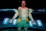 Robert Mintzer, 78 years old, of Freeport  excersises with water weights at the Freeport Recreation Center on April , 2004 in Freeport, New York.