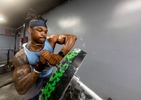 John Okoro performs a Landmine exercise during a workout at the Strength Factory gym on July 2, 2022 in Baldwin, New York. The athletes use unconventional fitness training methods when they exercise.  