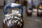 A Kettle Bell sits on the ground during a workout at the Strength Factory gym on July 18, 2022 in Baldwin, New York.  The workouts are led by the owner of the gym Thomas De Giuli.  The athletes he trains use unconventional fitness training methods when they exercise.  