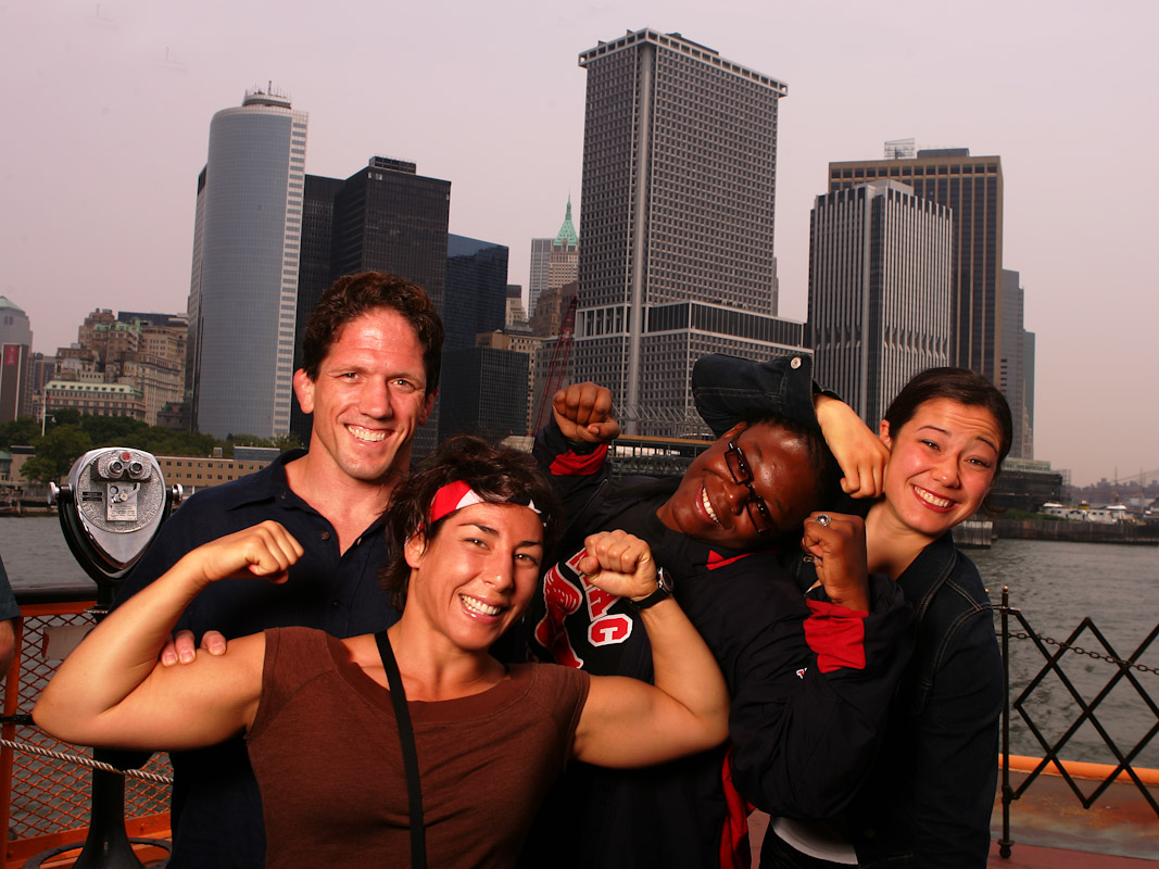 Patricia Miranda, Tela O'Donnell,  and Toccara Montgomery, and Head Coach Terry Steiner of the US Olympic Womans Wrestling team pose on the Staten Island Ferry on June 25, 2004 in Staten Island, New York. 