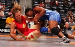 Toccara Montgomery of the US Olympic Woman's Wrestling team wrestles Christine Nordhagan of Canada at the Titans Games on June 20, 2004 in Atlanta Georgia.  