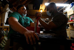 Danny Byrne (L) works with Jamal Perry during an Urban Arm Wrestling League training session at the home of Daniel Schwartz on April 22, 2021 in Deer Park, New York.  