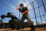 A student makes a call in a simulated baseball game during the Jim Evans Academy of Professional Umpiring on January 27, 2011 at the Houston Astros Spring Training Complex  in Kissimmee, Florida. 