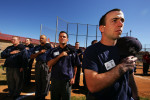 Student Umpires practice standing for The National Anthem during the Jim Evans Academy of Professional Umpiring on January 28, 2011 at the Houston Astros Spring Training Complex  in Kissimmee, Florida. 