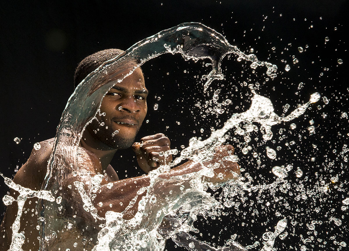 Light Heavyweight boxer Marcus Browne throws punches in the water  on August 19, 2014 in Old Bethpage, New York.  
