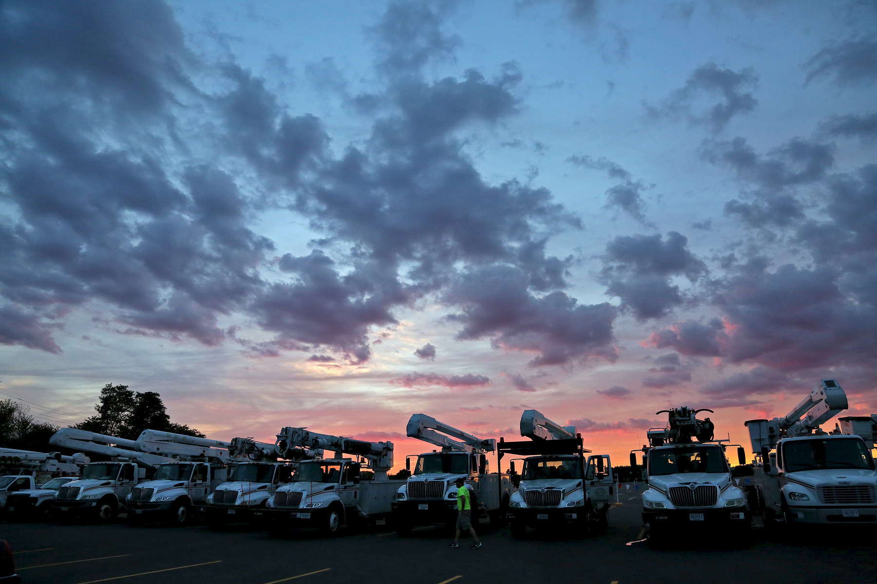 Trucks from Ohio Edison arrive at  Monmouth Park Racetrack in Oceanport, New Jersey on Friday September 2, 2016 to support Jersey Central Power & Light in preparation for Hurricane Hermine.