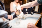Megan and William Elope in Burlington Vermont, with their sun Chase. They exchanged private vows in the back bar at Halverson's on Church Street.