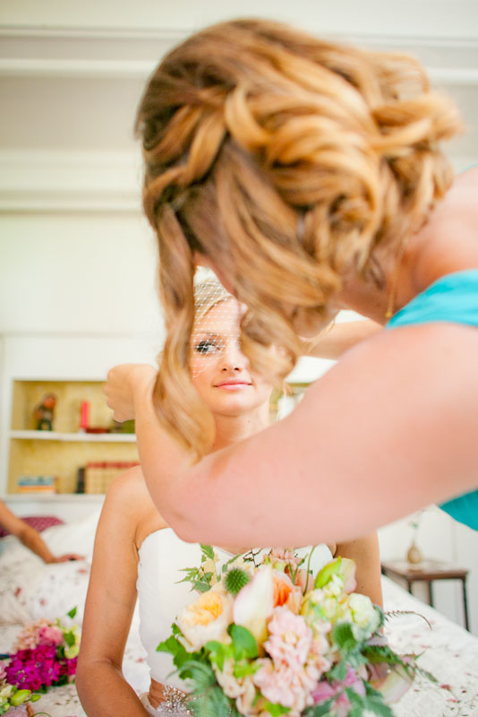 Bride getting ready at Turner Farmhouse in North Hero, by Vermont wedding photographers at Eve Event Photography