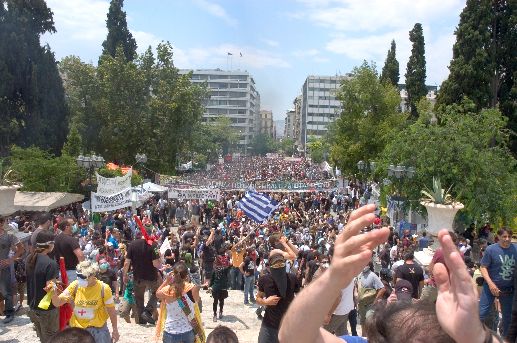 Demonstrators gather to protest the memorandum which is before the parliament on the second day of an historic 48 hour general strike. Athens, Greece. June 29, 2011.