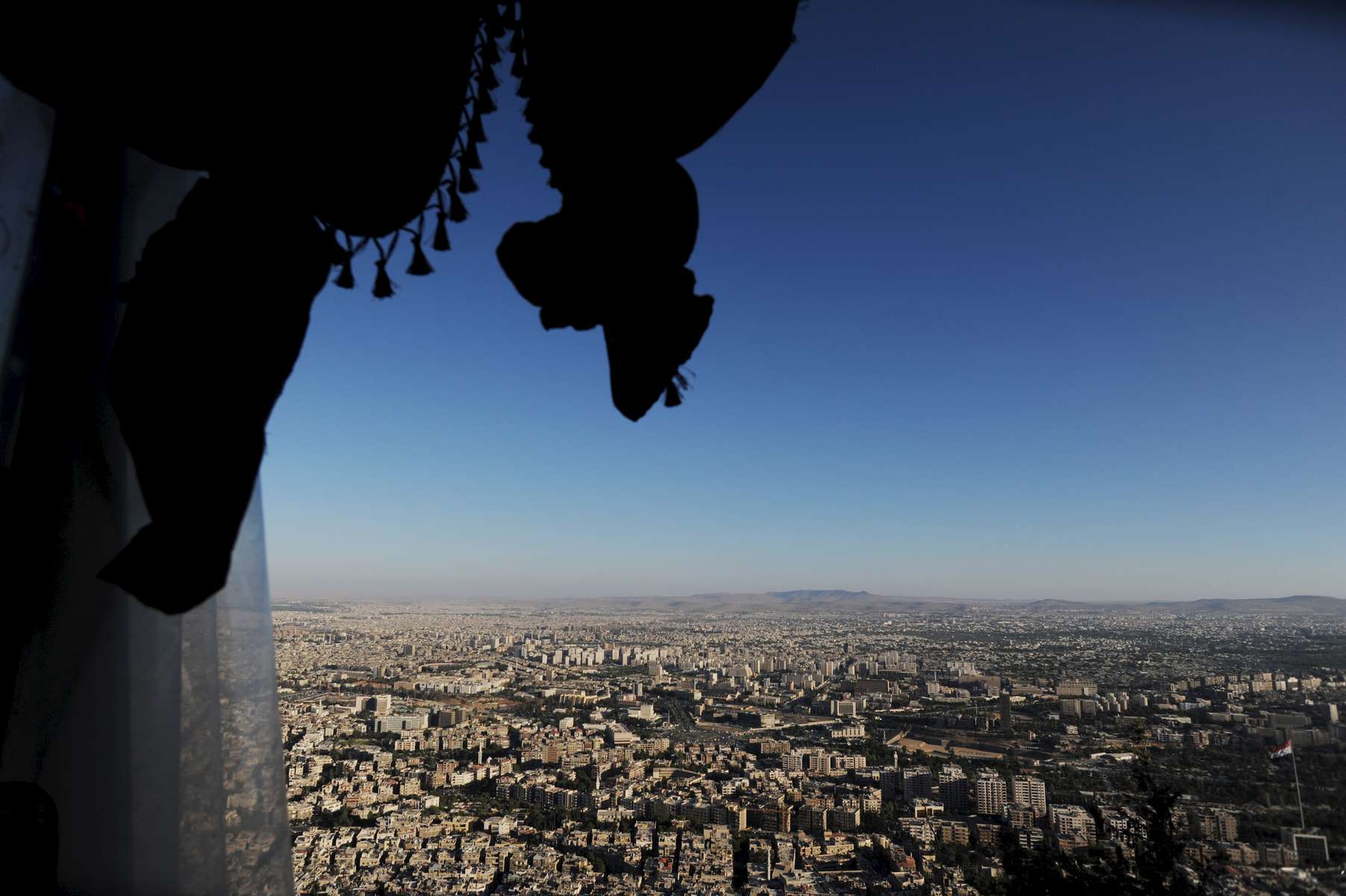 A view of Damascus from Jebel Al Qassioun, normally a place of picnicking and socializing, is currently deserted. 