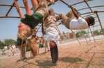 Students play on the jungle gym during recess at the Woodlyn Elementary School in Ridley Township, PA. The Ridley School District was one of the first in the Philadelphia area to require elementary students to wear uniforms. 
