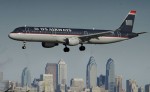 A US Airways jet lands at Philadelphia International Airport.