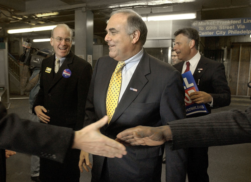 At a Philadelphia El stop, gubernatorial candidate Ed Rendell greets union representatives Robert Borski and Henry Nichols who are shaking hands.