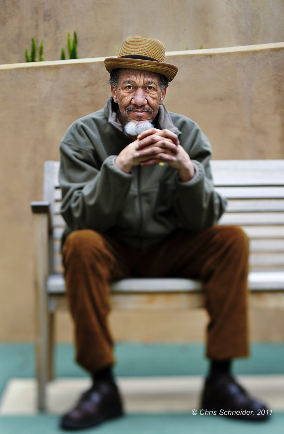 A portrait of a Mercy Housing resident outside his home in San Francisco for the Mercy Housing annual report.