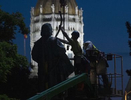 A crew removed a statue of Christopher Columbus from Columbus Green in Hartford early Monday morning. 