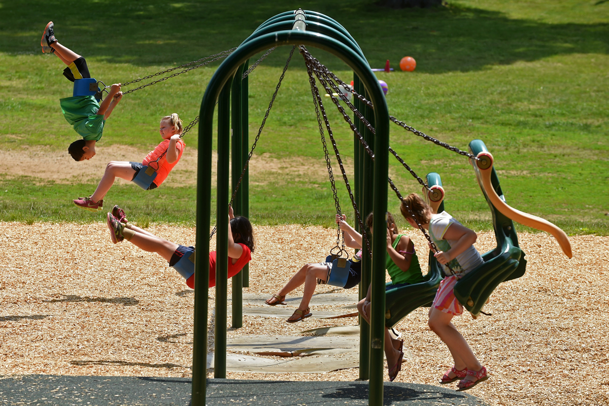 Students swing at Brooklyn Elementary School. 