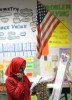 Salwa Abdussabur concentrates on a math problem during class at Vincent E. Mauro School.  After 7 years of homeschooling, she attended 5th grade in public school.    