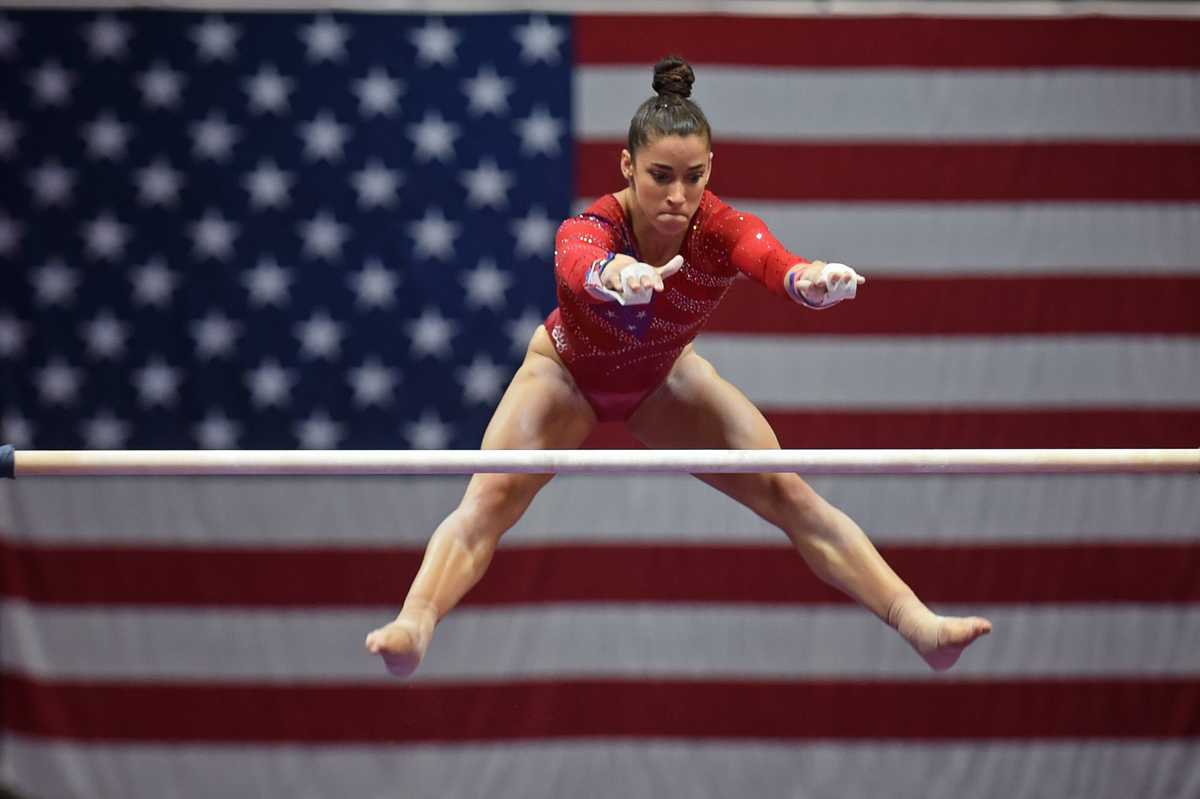 Alexandra Raisman competes on the uneven bars in the Secret US Classic at XL Center.
