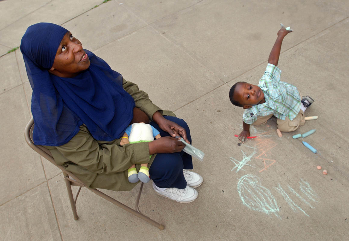 Rashidah Ahmad, of Cambridge, MA,spends some time with her grandson Amiyr Forrester, 3, of Watertown, MA outside Wilbur Cross High School during an intermission in the {quote}Fit Muslimah{quote} Summit.  Muslim women from all over the region traveled to New Haven to learn about fitness. 