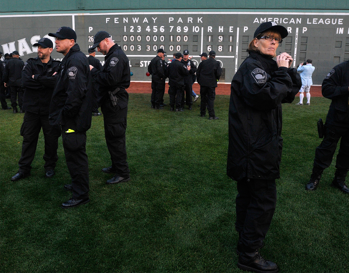 Boston Police prepare at Fenway Park for the Mayor's Rolling Rally Boston Red Sox victory parade through the city of Boston in October 2013.