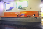 Allen lays down and takes in a subway exhibit at the Liberty Science Center in Jersey City. 