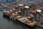 Aerial photo of intermodal containers being unloaded from a ship at Maher Terminals in Port Newark, New Jersey
