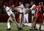 Rutgers head coach Greg Schiano(left) reacts to a call on the sidelines during 28-23 loss to Cincinnati, at Rutgers Stadium in Piscataway, New Jersey. Rutgers football coach Greg Schiano has taken the program from the worst ranked Division 1 team to a nationally ranked contender.     