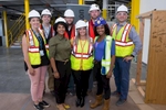 Group photo of culturally and racially diverse Amazon Management Team after tour of the new Amazon Fulfillment Center, in West Deptford, NJ on 8/17/18. 