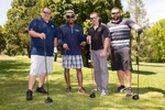 Golf foursome standing together at golf club during Eastern Energy Expo at Foxwoods Resort and Casino in Mashantucket, CT on 5/21/18.    