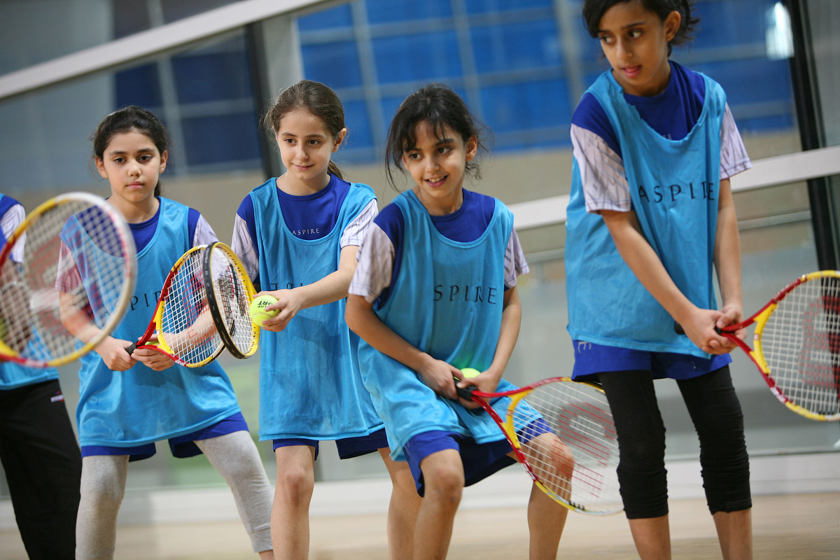 Young girls aged between 8-11 years participate in a sports class at the Aspire Academy in Sport City, Doha, Qatar, on March 24, 2008. The girls were selected on the basis of their skill level and fundamental sporting ability.